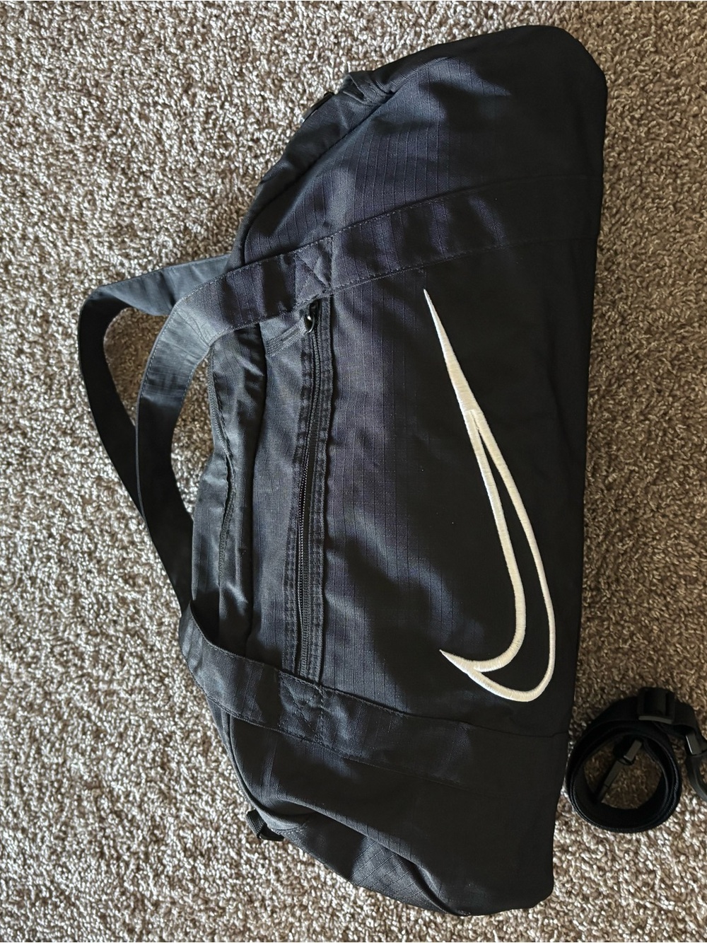 Nike Black Duffel Bag with White Swoosh Accent